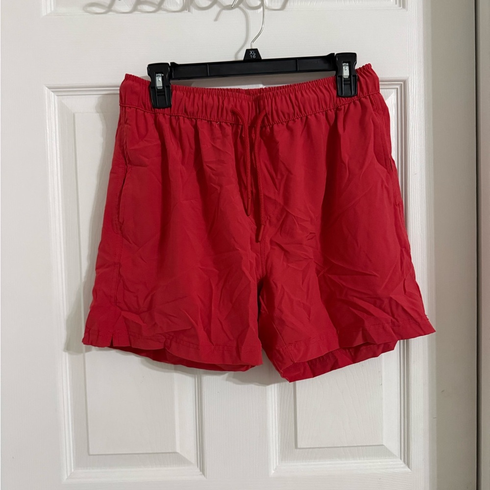 Forever 21 men’s peach colored swim trunks